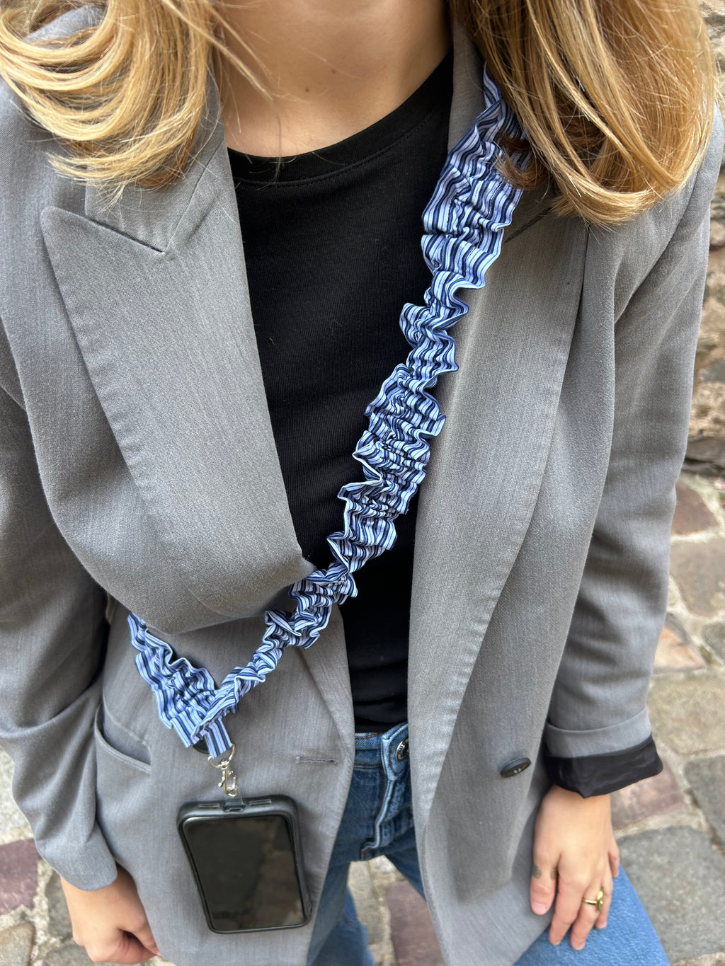 Bandoulière téléphone rayures bleues